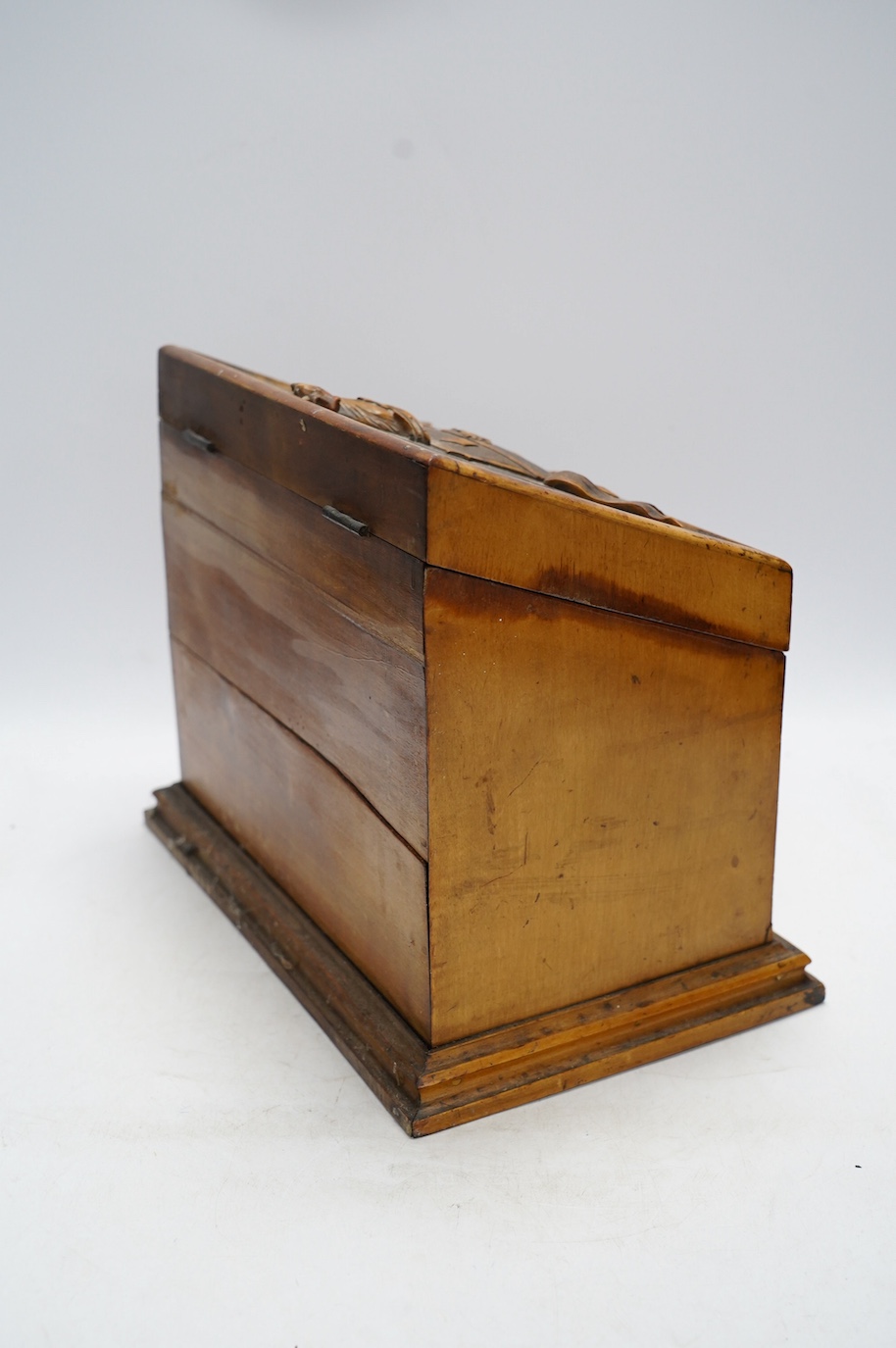 A Victorian carved fruitwood stationery box, 25cm tall. Condition - poor to fair